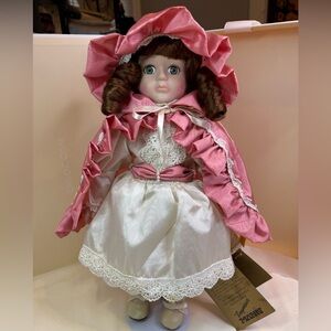 Elegant Pink and White Doll with Lace Detailing